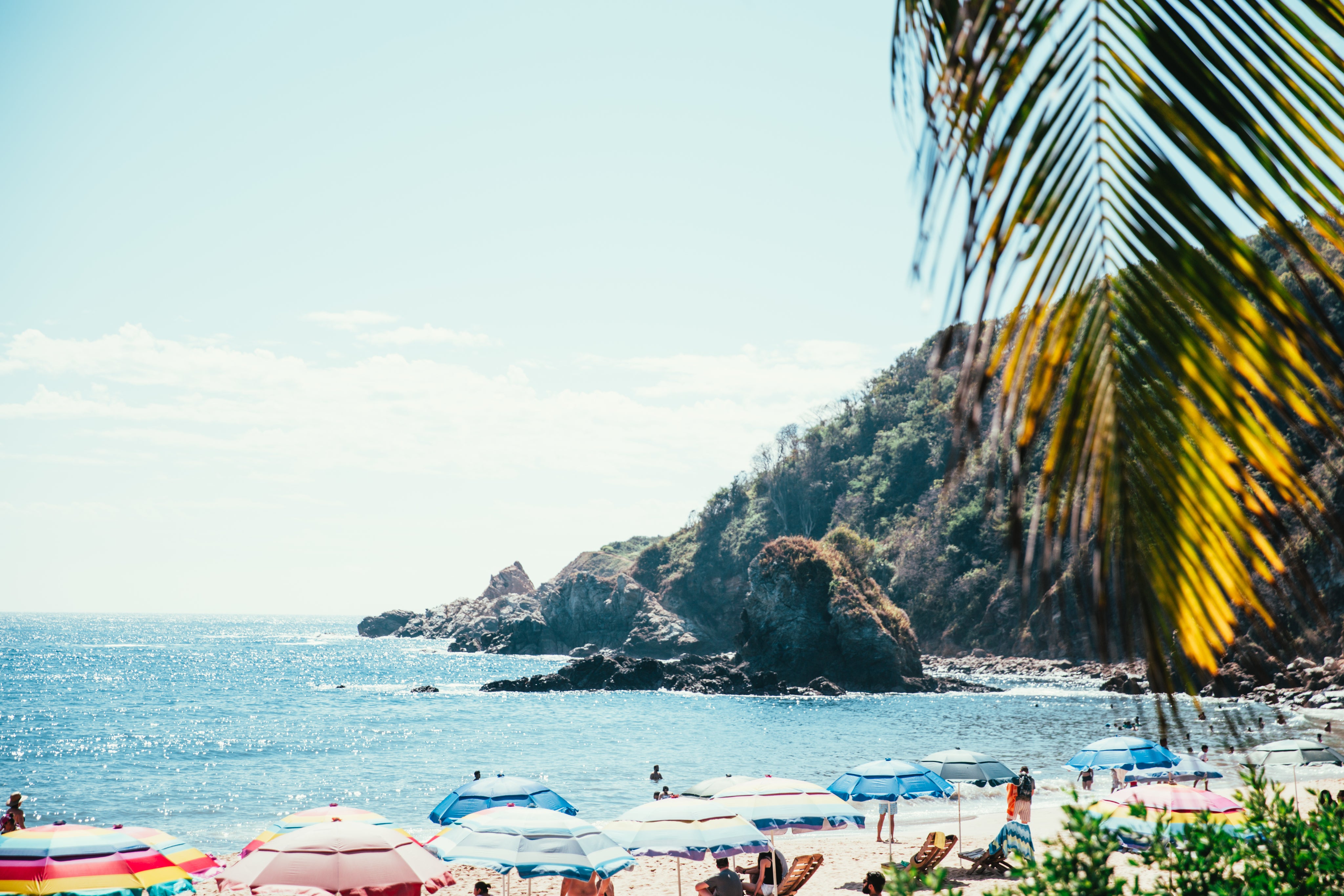 tropical-beach-below-cliff.jpg